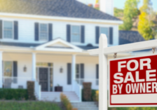 fsbo for sale by owner sign in front of a house